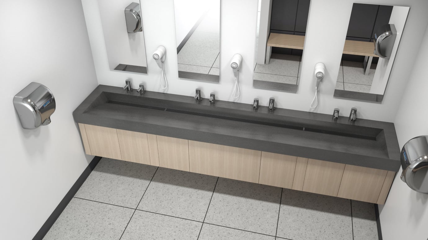 Aerial view of public restroom sink area with sensor faucets and hand dryers installed