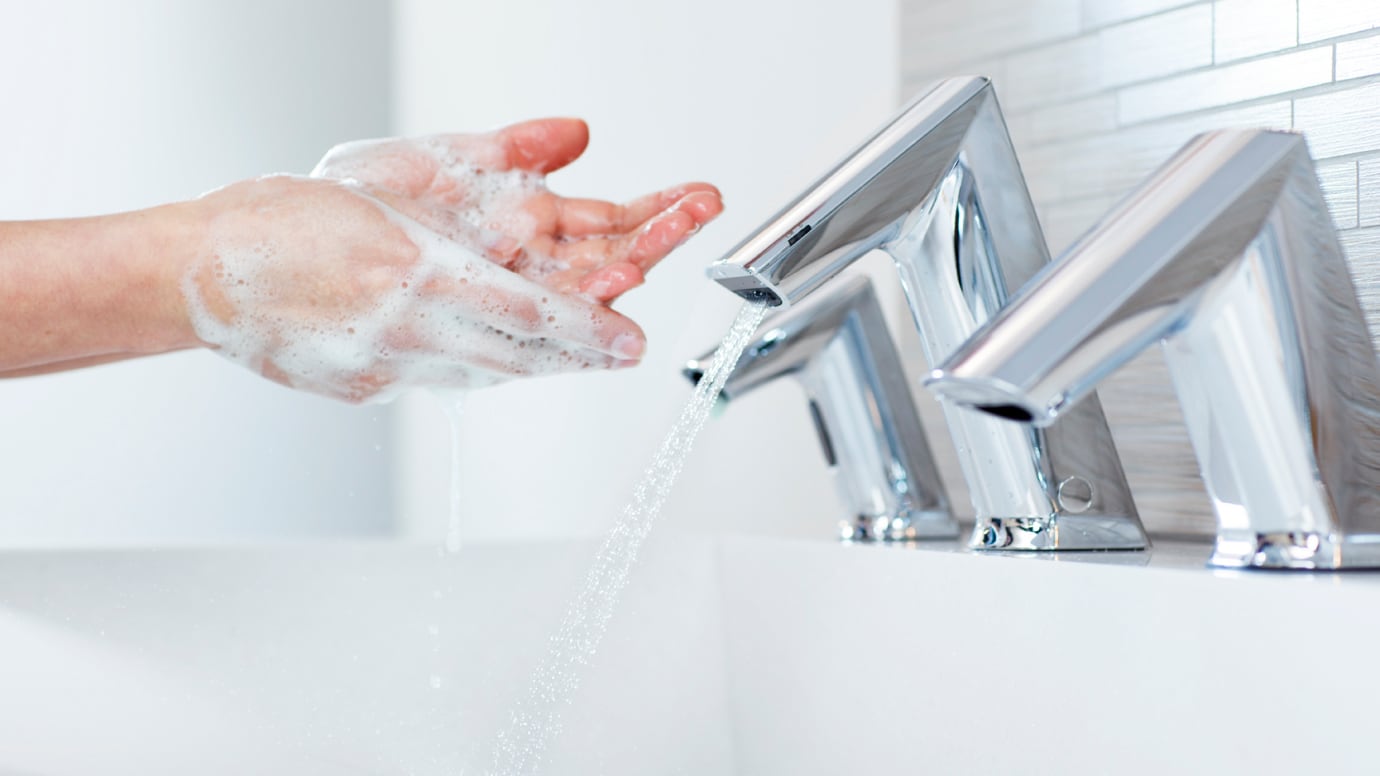 Up close photo of hands washing